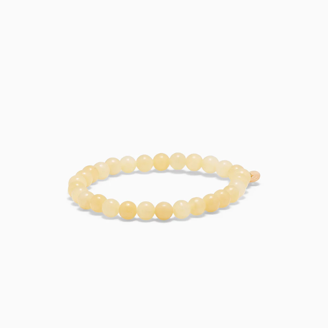 SOÏ -  KRYSTAL ARMBÅND - GUL JADE 6 MM.